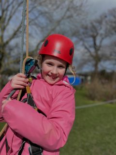 Happy smiles after whizzing down the zip line!
